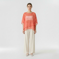 Blouse poncho transparente à superpositions