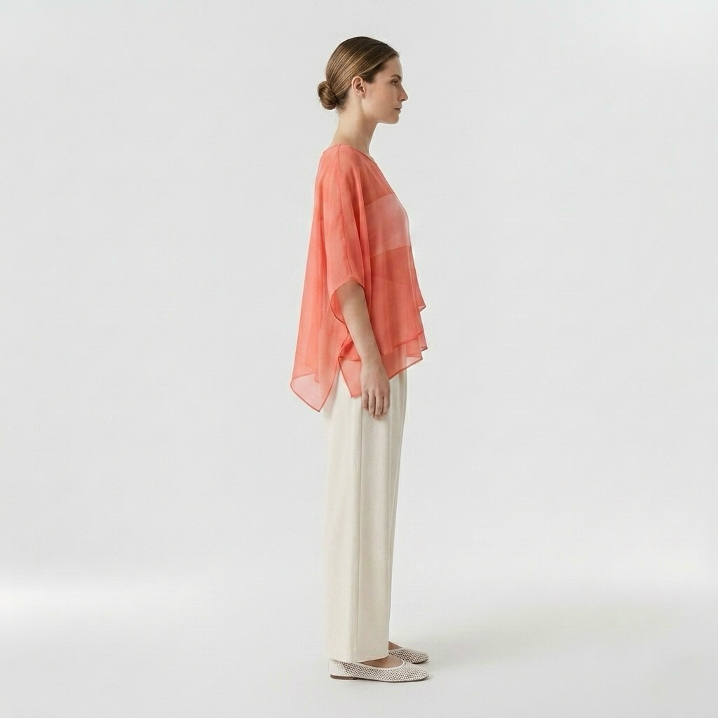 Blouse poncho transparente à superpositions