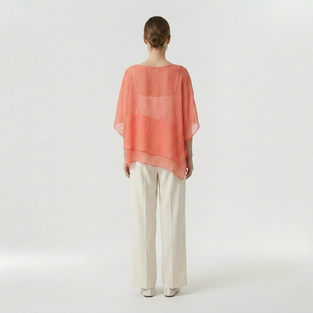 Blouse poncho transparente à superpositions
