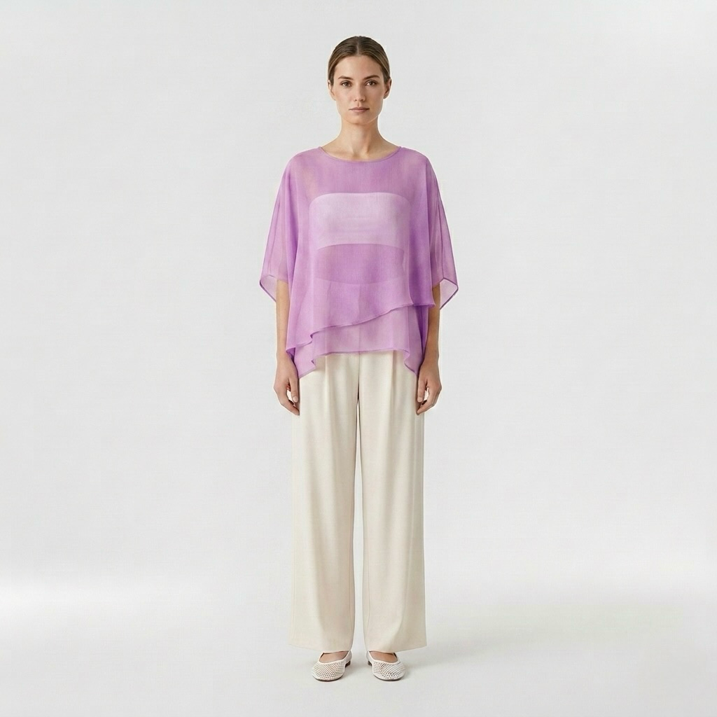 Blouse poncho transparente à superpositions